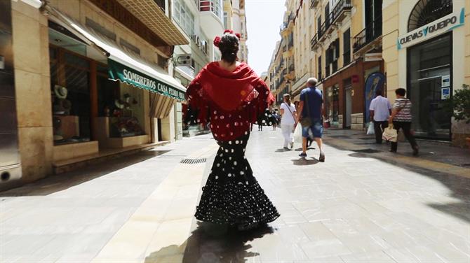 Woman at Malaga Feria in a Flamenco Dresses