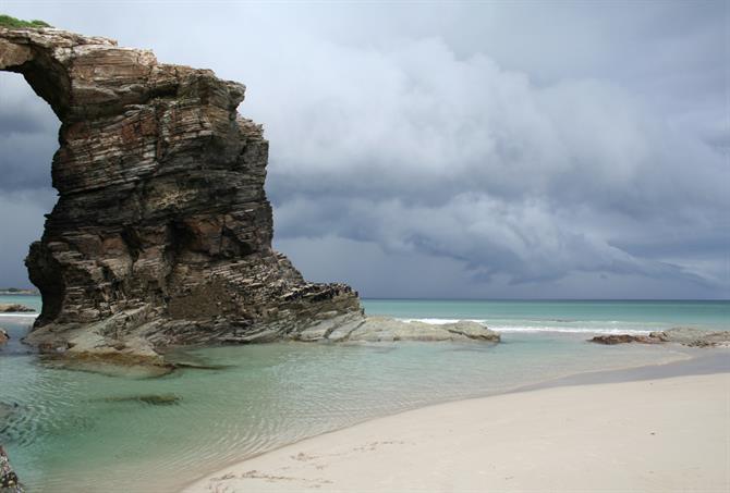 Arch on Playa de las Catedrales in Galicia