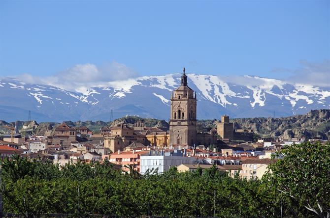 View of Cathedral and snow-capped mountains in Guadix