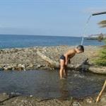 Shower on Alberquillas beach, Nerja