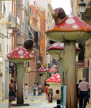 Calle San Francisco, Alicante, with childlike giant mushrooms