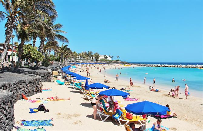 Families on Playa Flamingo in Lanzarote